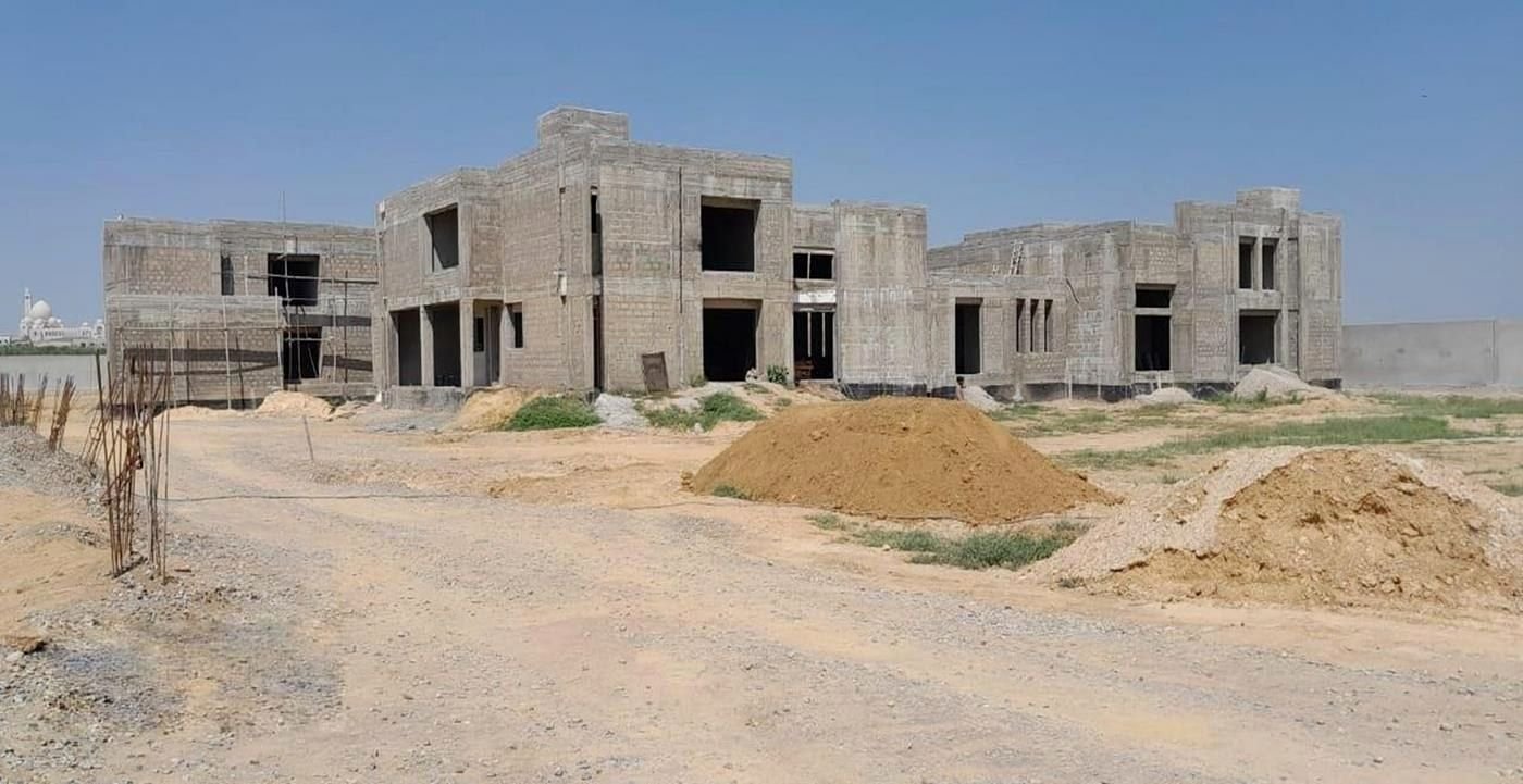 Grey structure construction by ABA Planners and Works